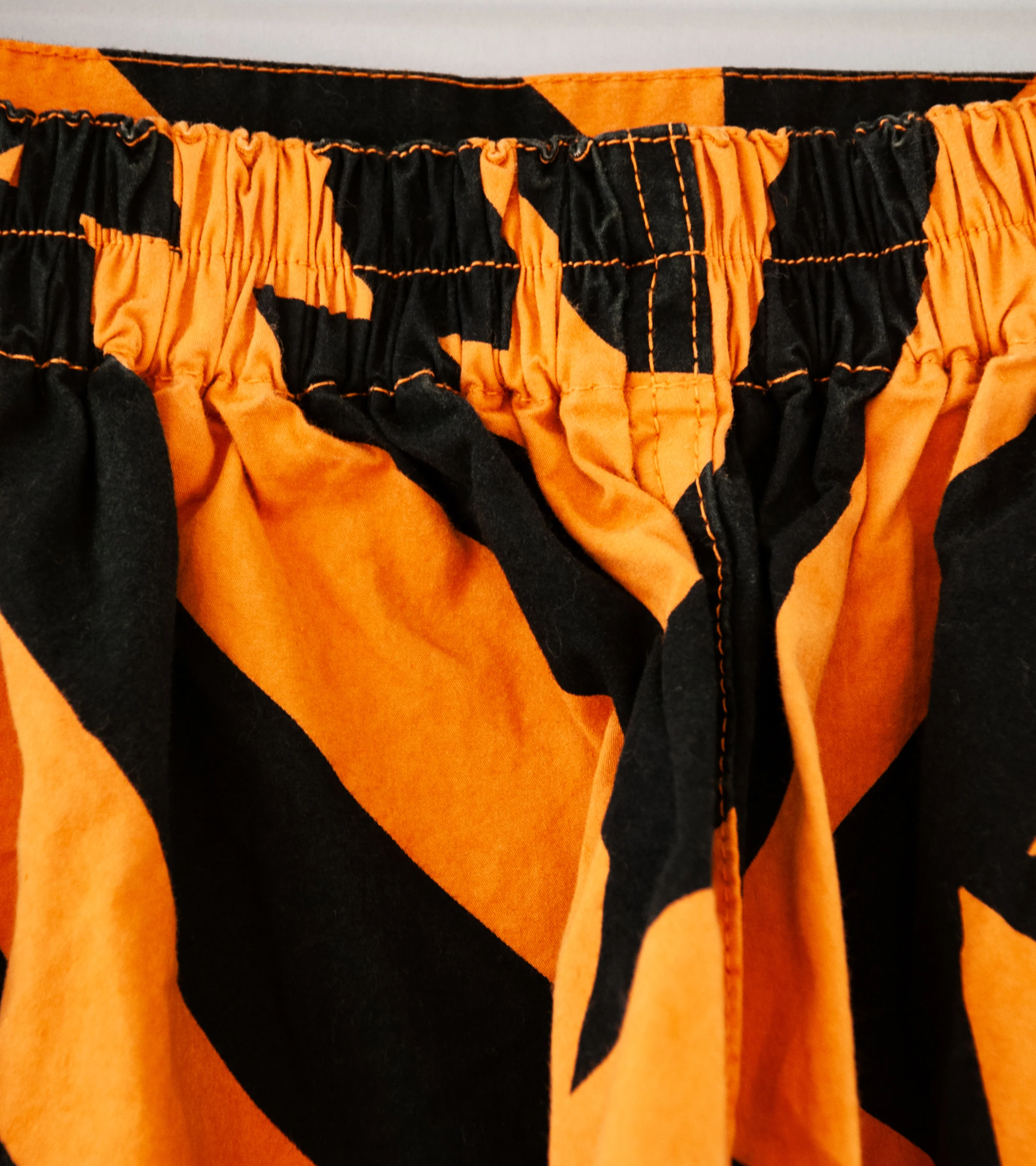 Offering 'Diamond Pant' (Orange Black) - Image 6